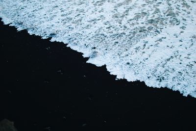 Close-up of snow on sea