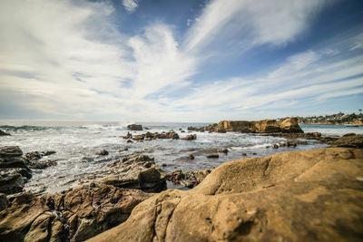 Scenic view of beach against sky