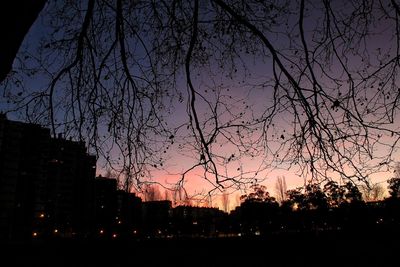 Silhouette of city at sunset