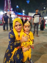 Portrait of mother and son during festival