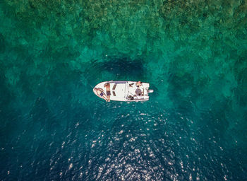 High angle view of people in sea