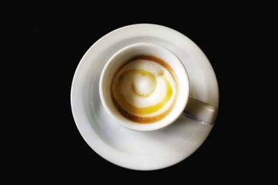 High angle view of coffee on table against black background