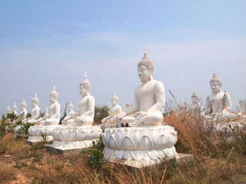 Buddha statue against sky