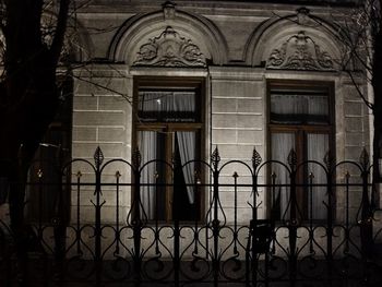 Close-up of gate against building