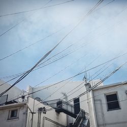 Low angle view of electricity pylon