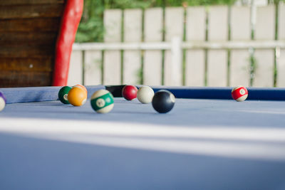 Close-up of multi colored ball on table