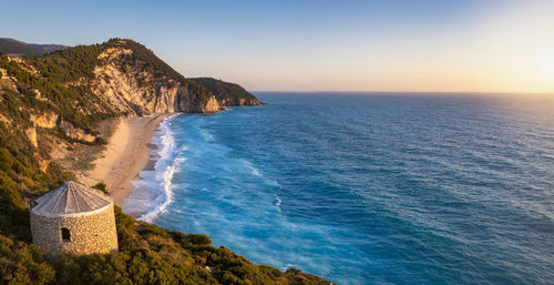 Scenic view of sea against clear sky