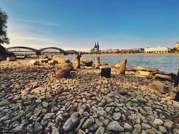 View of bridge and river against sky