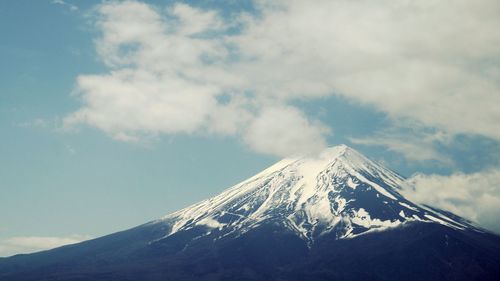 Low angle view of mount fuji against sky