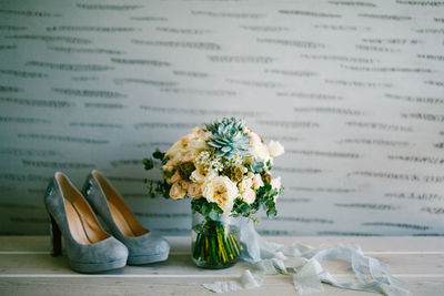 Close-up of flower vase on table