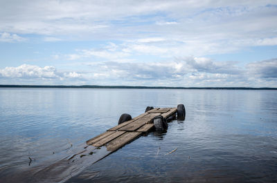 Boat on sea against sky