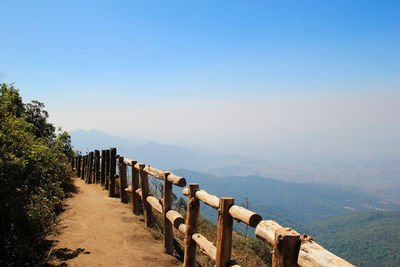 Scenic view of mountains against clear blue sky