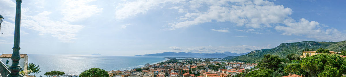 Panoramic view of townscape by sea