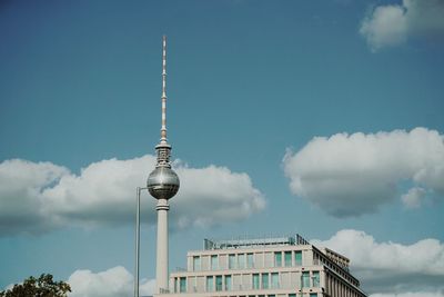 Low angle view of fernsehturm tower against sky