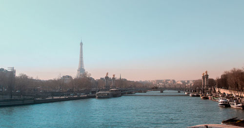 View of buildings in city against clear sky