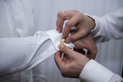Close-up of woman holding hands
