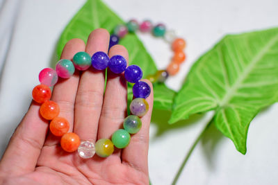 Close-up of hand holding candies