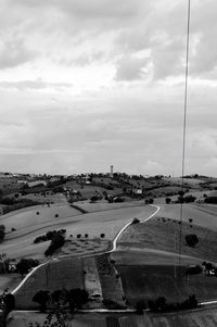 Landscape against cloudy sky
