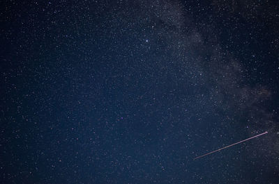 Low angle view of vapor trails in sky