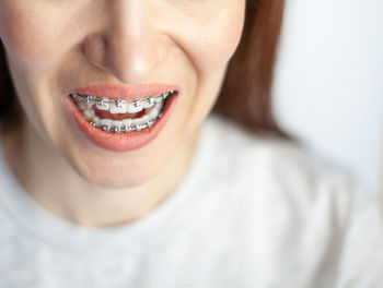 Close-up portrait of smiling young woman