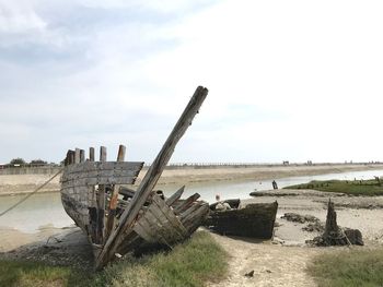 Panoramic view of old beach by sea against sky