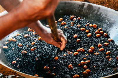 Close-up of person preparing food