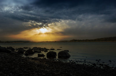 Scenic view of sea against sky during sunset