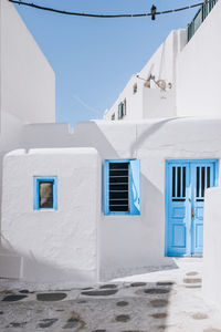 White building against blue sky