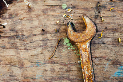 Close-up of rusty metal on table