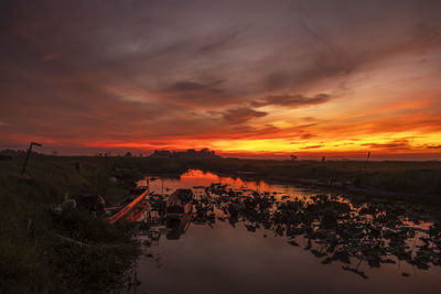 Scenic view of dramatic sky during sunset