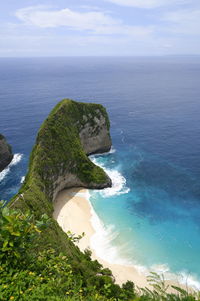 Scenic view of sea against sky at kelilingking beach nusa penida