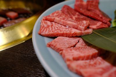 High angle view of meat in plate on table