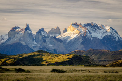 Scenic view of snowcapped mountains against sky