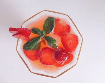 High angle view of strawberry over white background