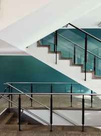 High angle view of staircase by building against sky