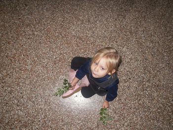 High angle view of cute boy playing