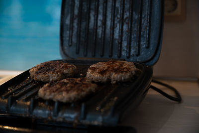 Close-up of bread on barbecue grill