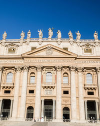 Low angle view of building against blue sky