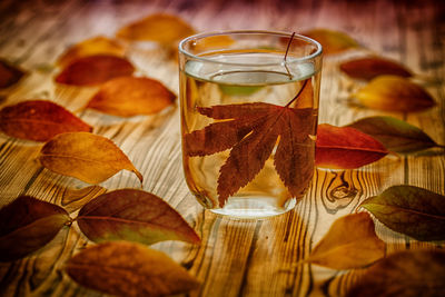 Close-up of dry leaves on table