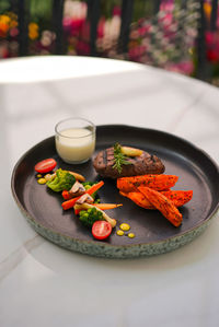 Close-up of food in plate on table