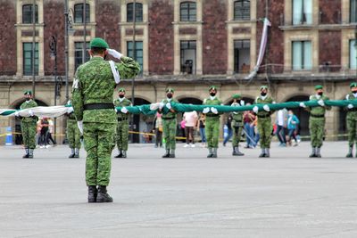 People walking on street in city