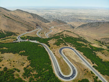 High angle view of road on landscape against sky