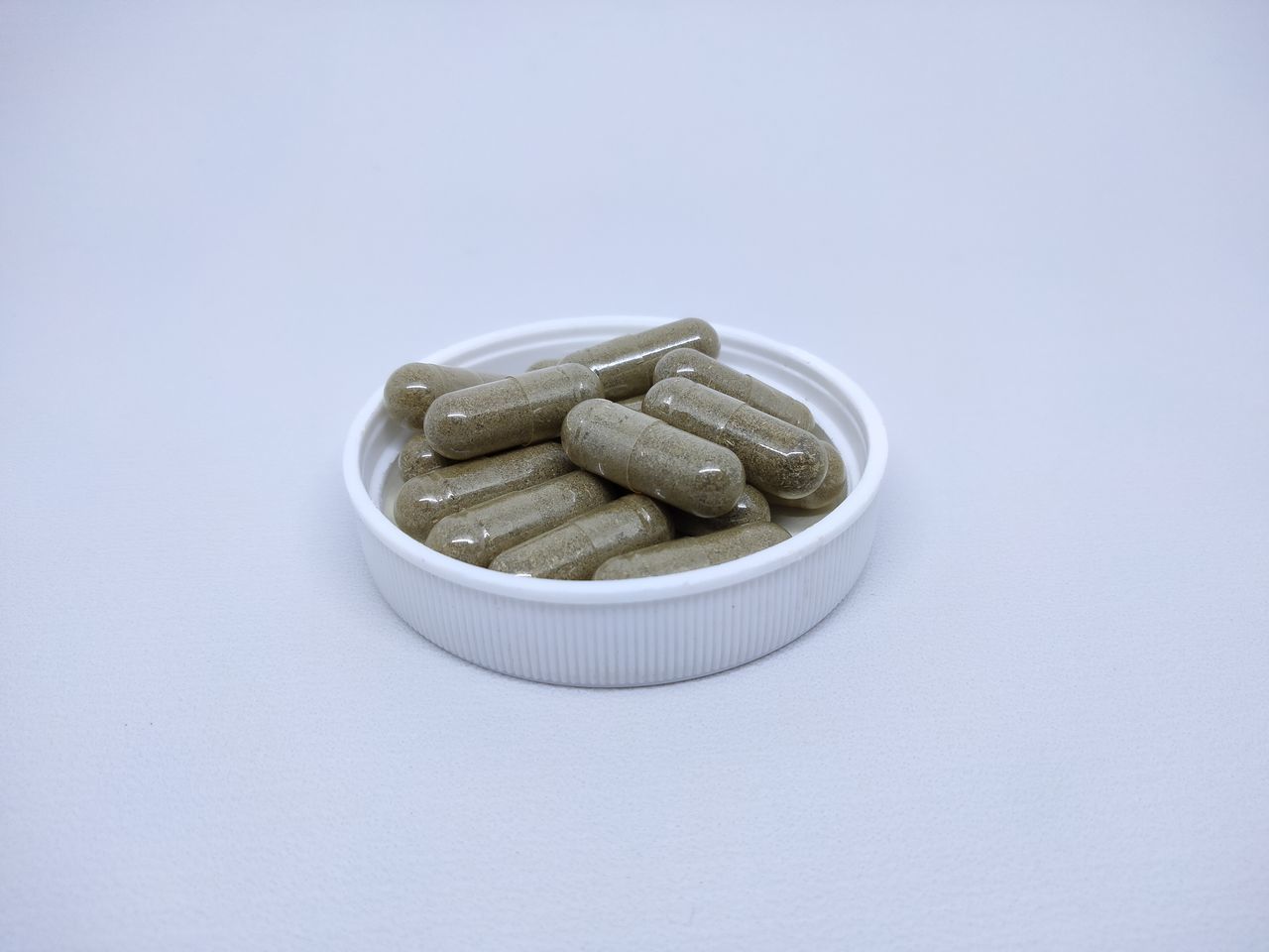 pill, dose, pharmaceutical drug, studio shot, medicine, healthcare and medicine, indoors, capsule, drug, nutritional supplement, no people, food, large group of objects, food and drink, still life, white background, copy space, vitamin, social issues, close-up, container