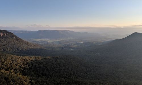 Scenic view of mountains against sky during sunset