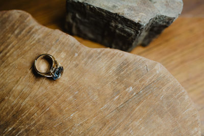 High angle view of wedding rings on table