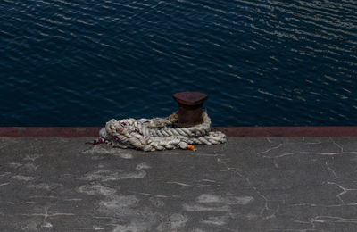 Rope and bollard at the harbour of sassnitz on the german island rügen