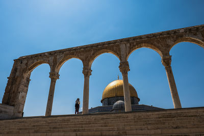 Low angle view of dome of the rock against clear sky