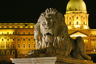 Statue of historical building at night