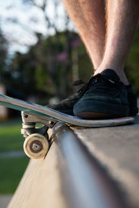 Close-up skateboarder in a ramp