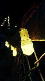 Low angle view of illuminated light bulb